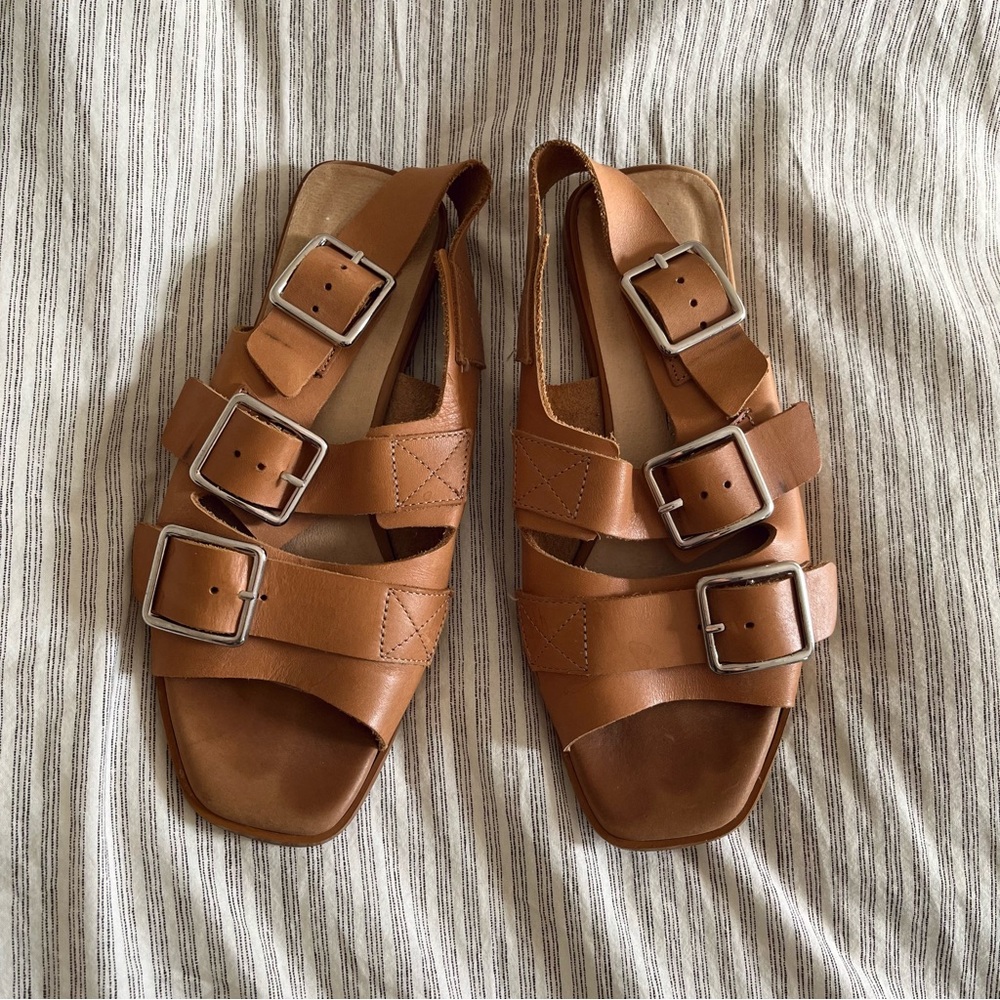 Intentionally blank leather buckle sandals
